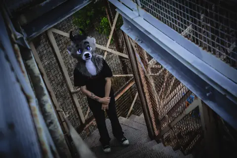 Fire-escape portrait, photo by Beefshanks